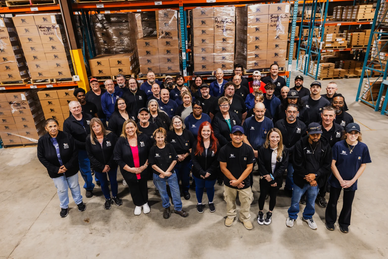 The Epsen Hillmer Graphics team assembles in the warehouse