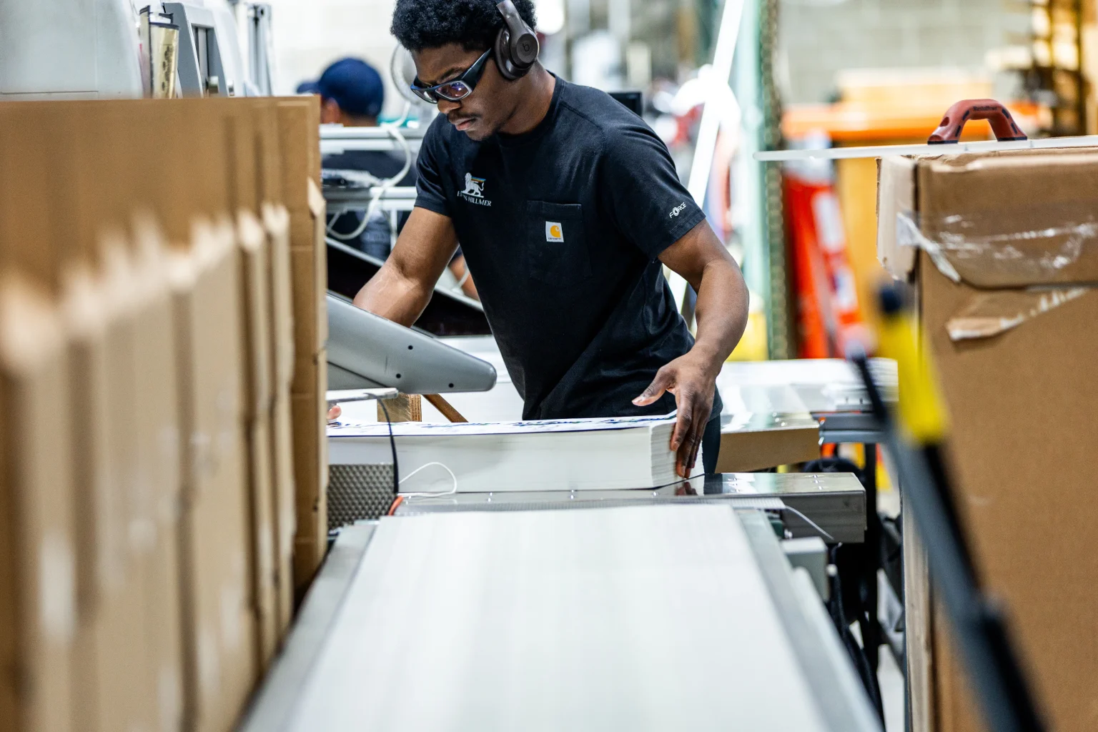 Product label trends influence the type and size of product labels packed by employees at Epsen Hillmer, seen here.