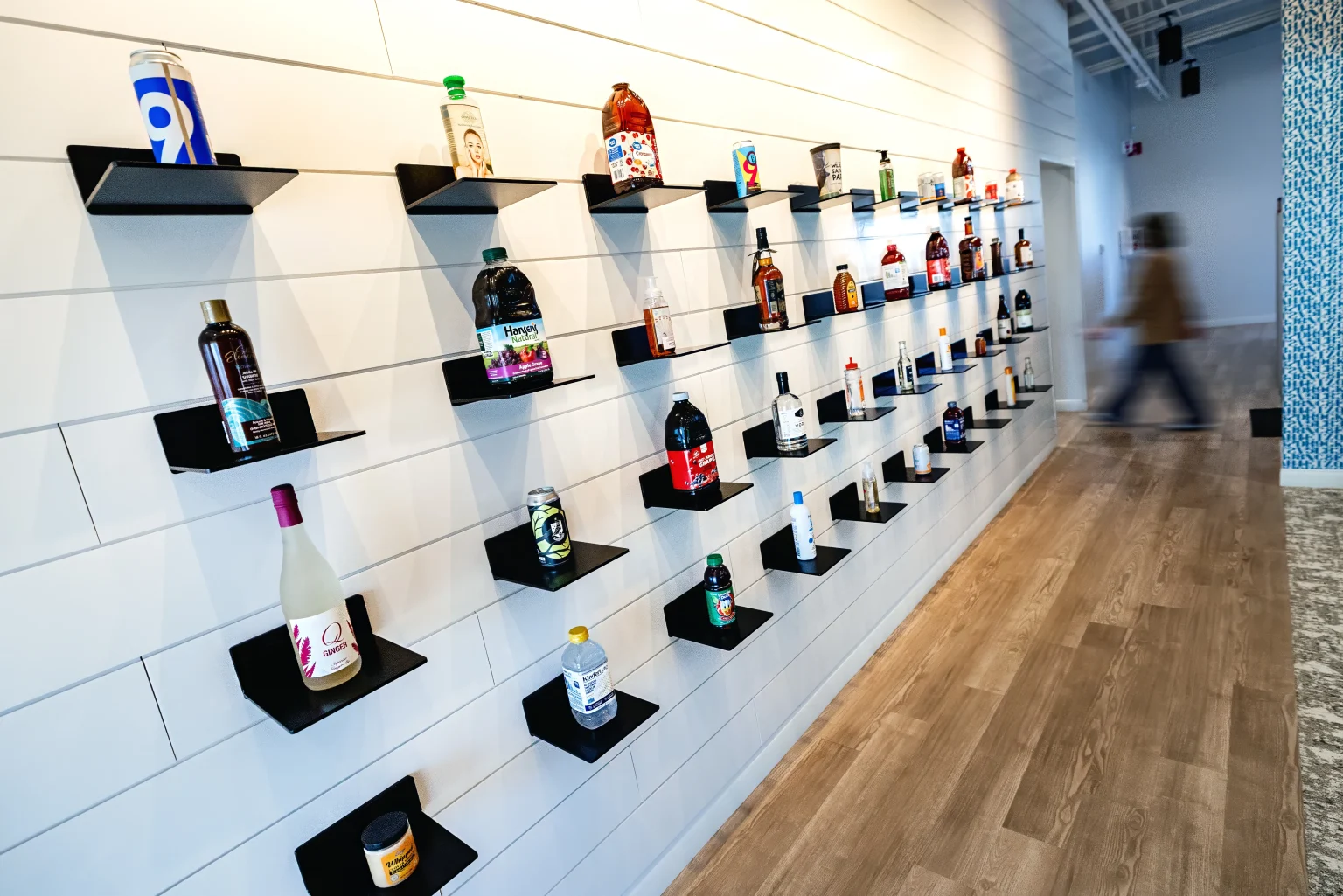 A wall of diverse products with custom labels